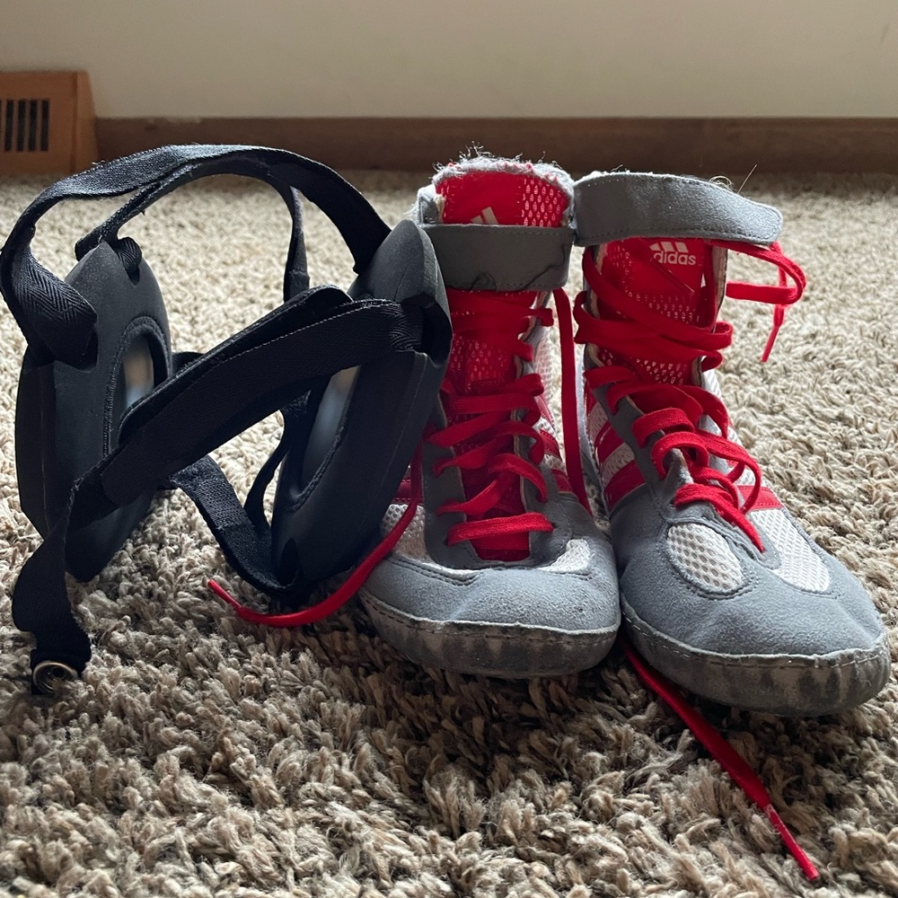 Boys wrestling shoes and headgear.